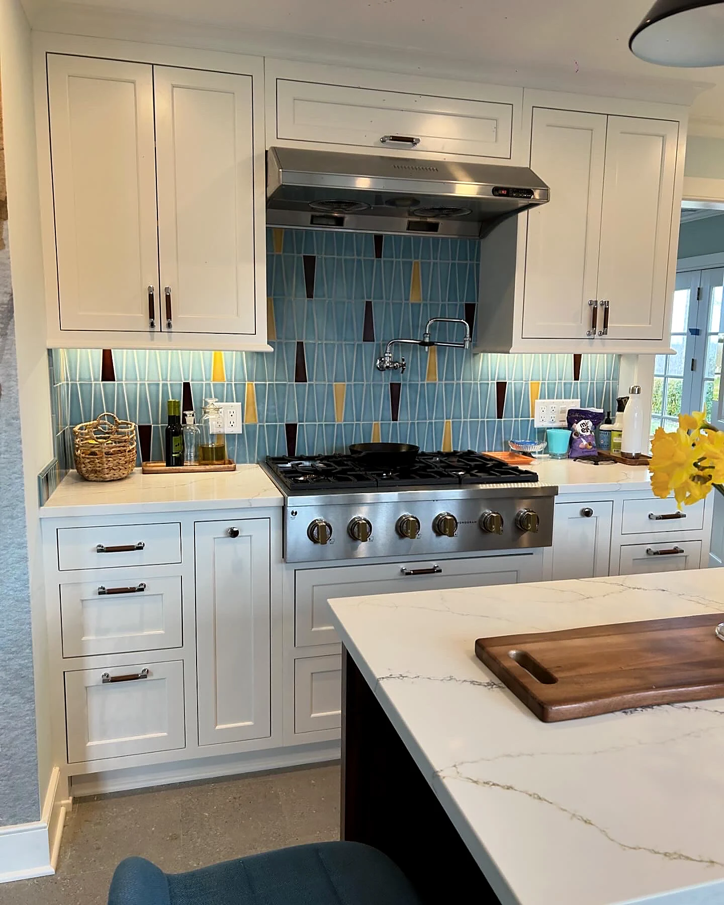 Tile backsplash and range wall